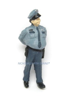 POLICEMAN WALKING HIS BEAT