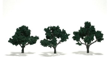 THREE DARK GREEN TREES