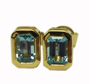Blue topaz earrings 14kt yellow gol 1.50cttw model 030-CGE243Y-1BT