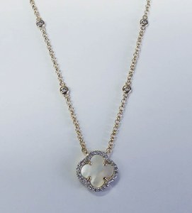 14kt yellow gold and mother of pearl in diamond frame pendant on 16.5" 14kt chain model 048-NDY1067-302.