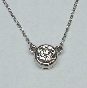 Diamond pendant full bezel 0.73 ct round brilliant on 18" white gold chain model 144-2930-073