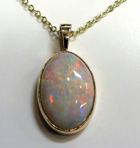 Opal pendant 14kt yellow gold frame 13.58 carat oval cut opal model SWP-Opal-1358