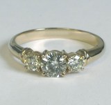Diamond Engagement Ring 0.40 carat round with 0.30 carat total weight side stones 14kt yellow model 175-009
