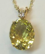 Yellow citrine 16.09 carat oval cut 14kt yellow gold 0.15carat diamond model 273-3582