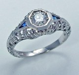 Gordon Clark diamond and sapphire ring .56cttw .33ct center rd GC5007