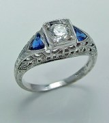 Gordon Clark Diamond and sapphire ring 18ktw gold 1.04cttw 0.39ct center model GC5065