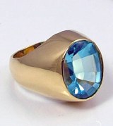 Blue topaz ring 18kt yellow gold 6.49ct