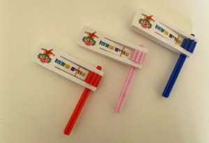 Plastic Gragger Purim Sameach with Colored Handle Assorted Colors Single Piece