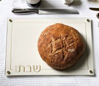 Additional picture of Lucite Challah Board Glass Top Embroidered Leatherette Gold Design