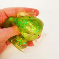 Additional picture of Glitter Passover Squish Frog Green