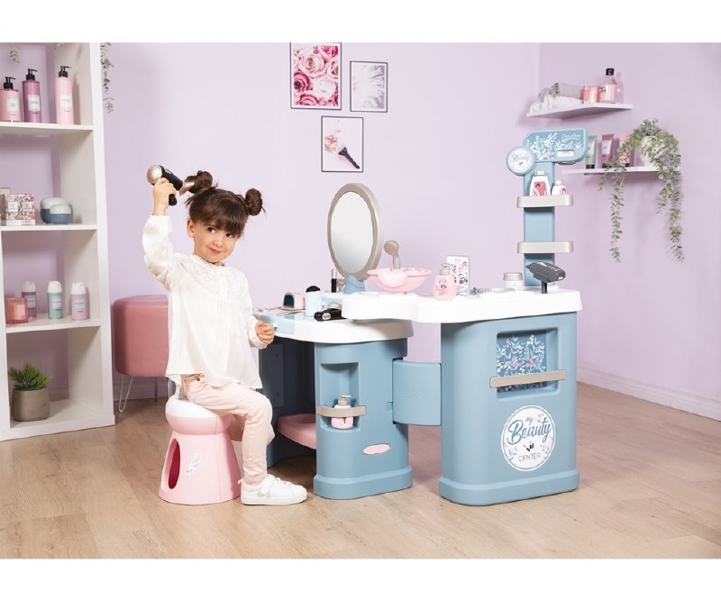 The Smoby Beauty Centre is a foldable beauty salon with three distinct play  areas; a dressing table, shampoo area and a counter! With lots of fun, By Smoby UK