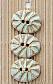 Incomp Buttons L584 Oval Flowd