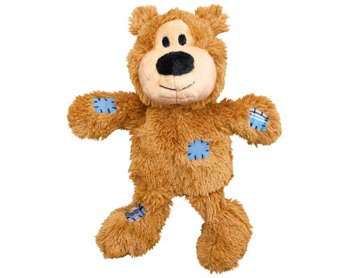 dog inside teddy bear