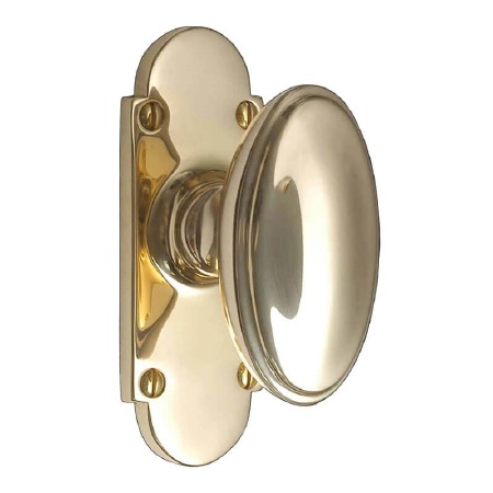 Constable Oval Door Knobs on Small Latch Plate Polished Brass Unlacquered