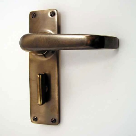 Aston Victorian Plain Bathroom Door Handles Antique Brass Unlacquered