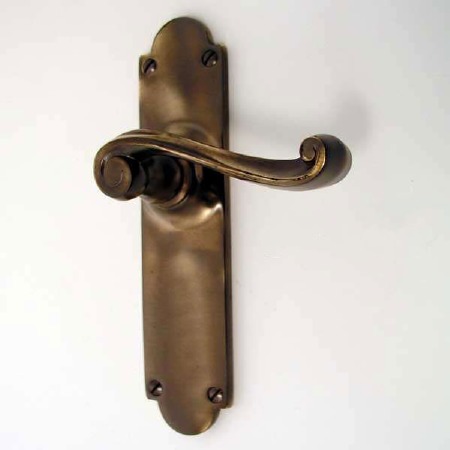 Aston Victorian Scroll Door Handles Antique Brass Unlacquered