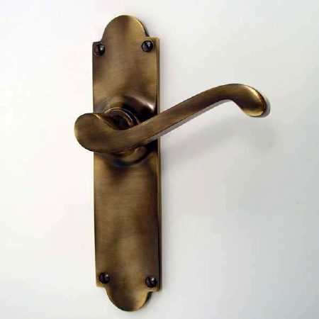 Aston Victorian Door Handles Antique Brass Unlacquered