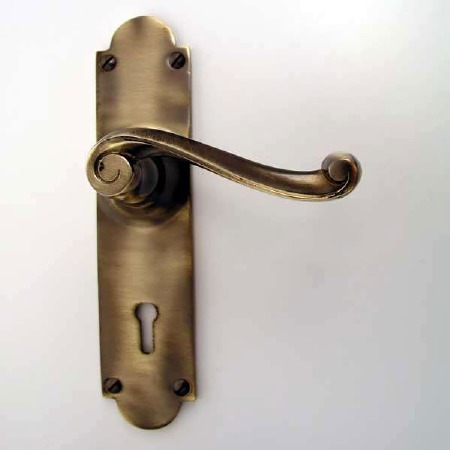 Aston Victorian Scroll Door Handles Lock Plate Antique Brass Unlacquered