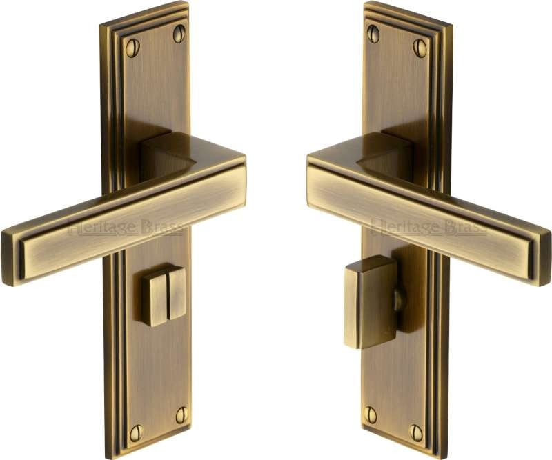 Heritage Atlantis Bathroom Door Handles Atl5730 Antique Brass Lacquered Broughtons Lighting 1571