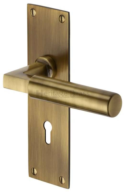 Heritage Bauhaus Door Lock Handles Bau7300 Antique Brass Lacq