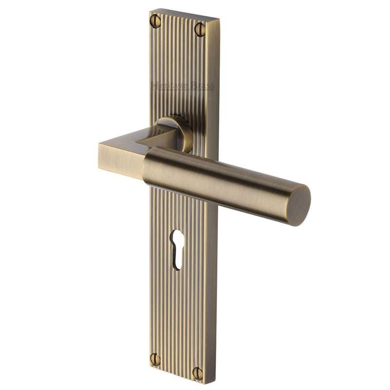 Heritage Bauhaus Reeded Lock Door Handles Antique Brass Lacquered Broughtons Lighting 2867