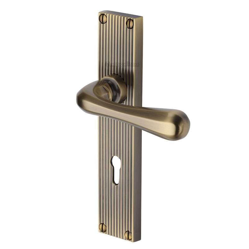 Heritage Charlbury Reeded Lock Door Handles Antique Brass Lacquered Broughtons Lighting 5416