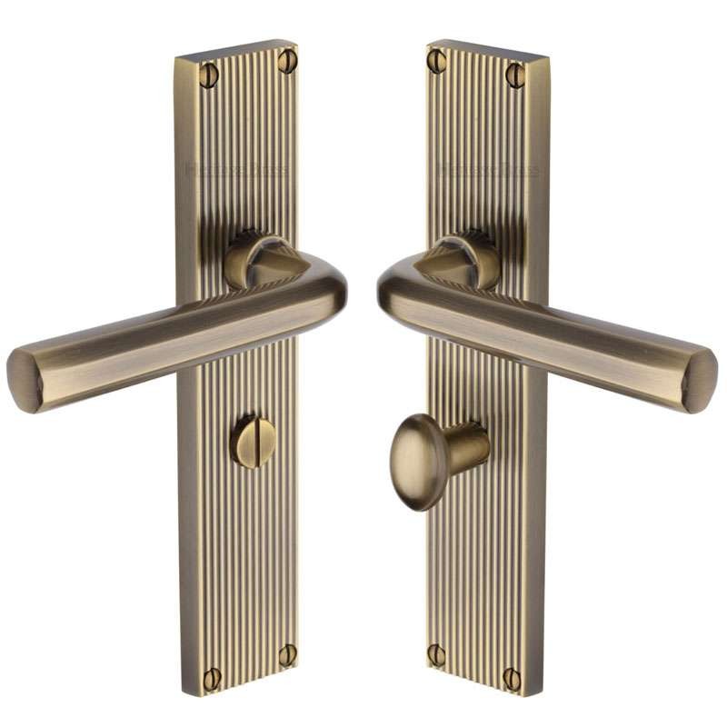 Heritage Octave Reeded Bathroom Door Handles Antique Brass Lacquered Broughtons Lighting 0658