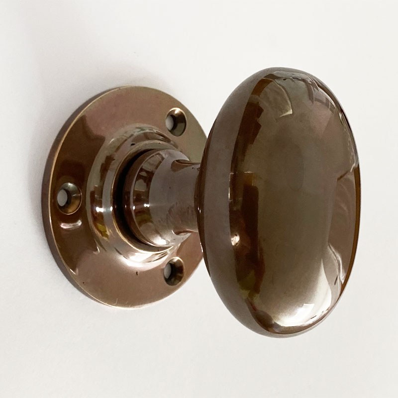 Aston Oval Door Knobs Polished Solid Bronze Antiqued 59mm Broughtons