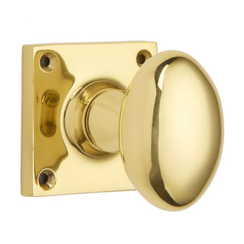 Oval Door Knob On Square Rose Polished Brass Unlacquered Broughtons Lighting And Ironmongery 0073