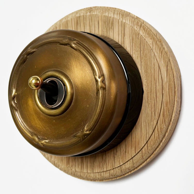 Reed & Ribbon Round Dolly Light Switch 1 Gang Antique Satin Brass Black ...