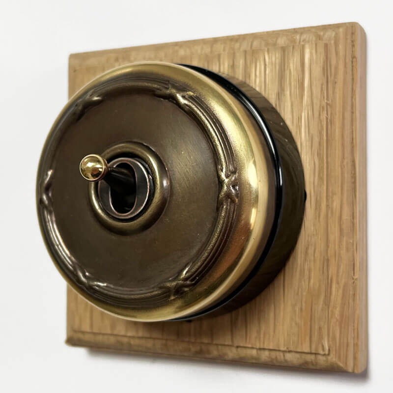 Reed & Ribbon Round Dolly Light Switch 1 Gang Renovated Brass Black