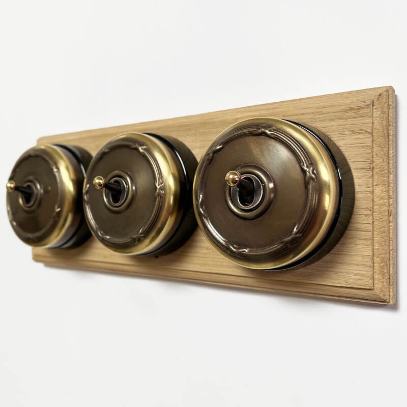 Reed and Ribbon Dome Dolly Light Switch 3 Gang Renovated Brass Black