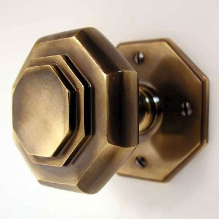 Aston Octagonal Cushion Mortice Door Knobs Antique Brass Unlacquered