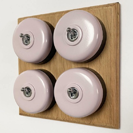 Round Dolly Light Switch 4 Gang Lilac on Oak Pattress with Black Mounts