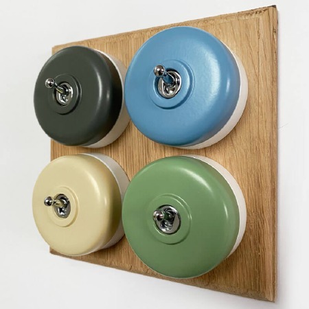Round Dolly Light Switch 4 Gang Mix and Match on Oak Pattress with White Mounts