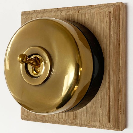 Round Dolly Light Switch 1 Gang Renovated Brass Black Base