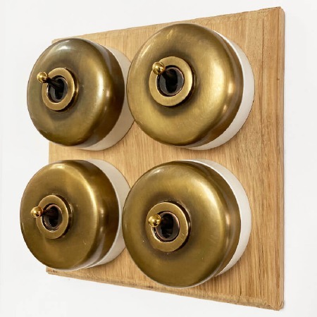 Round Dolly Light Switch 4 Gang on Oak Base Antique Satin Brass White