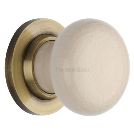 Heritage Porcelain Door Knobs Cream Crackle with Antique Brass Rose