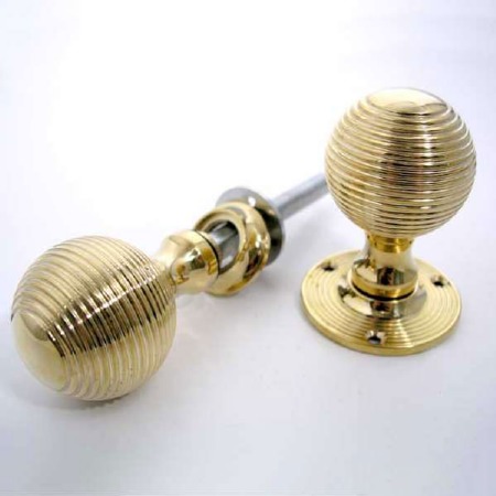 Aston Reeded Ball Rim Door Knobs 48mm Polished Brass Unlacquered