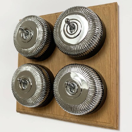 Reeded Round Dolly Light Switch 4 Gang on Oak Base Polished Chrome Black