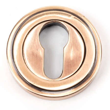 From The Anvil Round Euro Profile Escutcheon Art Deco Polished Bronze