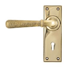 From The Anvil Newbury Hammered Door Lock Handles Aged Brass