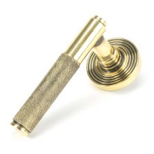 From The Anvil Brompton Lever Door Handles Beehive Aged Brass Unsprung