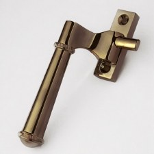 Aston Ribbon Casement Fastener Rim Strike Left Hand Antique Brass Unlacquered