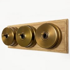 Citadel Dolly Switch on Wooden Base 3 Gang Antique Satin Brass