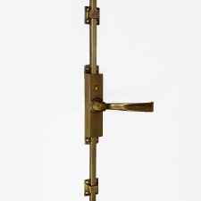 Aston Narrow Locking Cremone Bolt with Classic Lever Antique Brass Unlacquered Aston Narrow Locking Cremone Bolt with Classic Lever Antique Brass Unlacquered