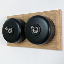 Round Dolly Light Switch 2 Gang Black on Oak Pattress with Black Mounts