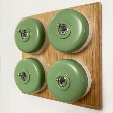 Round Dolly Light Switch 4 Gang Green on Oak Pattress with White Mounts