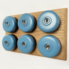 Round Dolly Light Switch 6 Gang Blue on Oak Pattress with Black Mounts