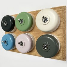 Round Dolly Light Switch 6 Gang Mix and Match on Oak Pattress with White Mounts